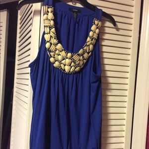 Blue top with white embellishment